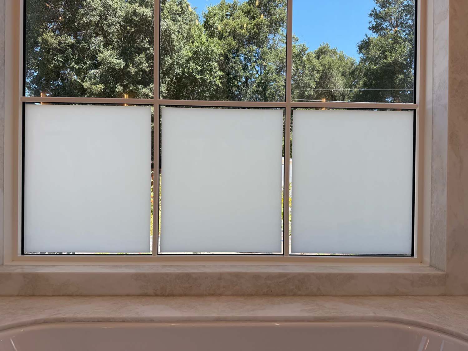 Our team knows how to use 3M Frosted Window Film strategically, as seen in the bathroom in Healdsburg, CA, featured in this post.