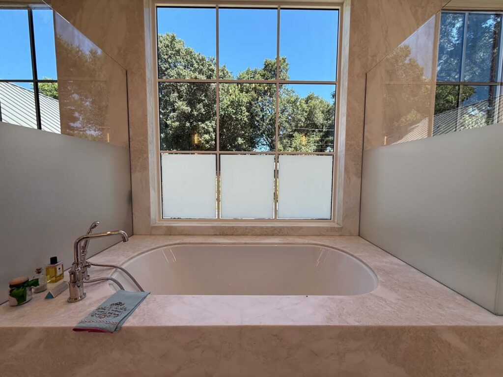 Our team knows how to use 3M Frosted Window Film strategically, as seen in the bathroom in Healdsburg, CA, featured in this post.