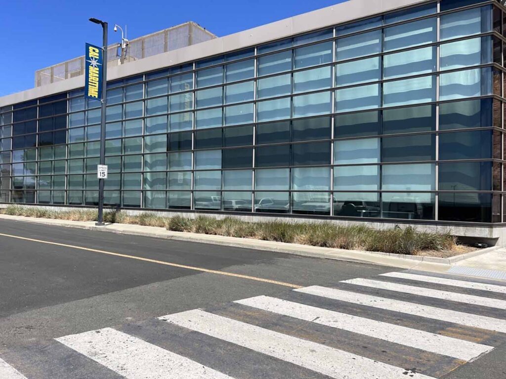 Large glass windows receive solar protection without compromising views.